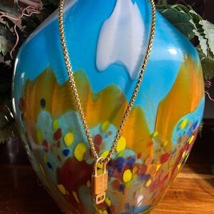 Louis Vuitton Gold lock and key No. 301 Necklace
